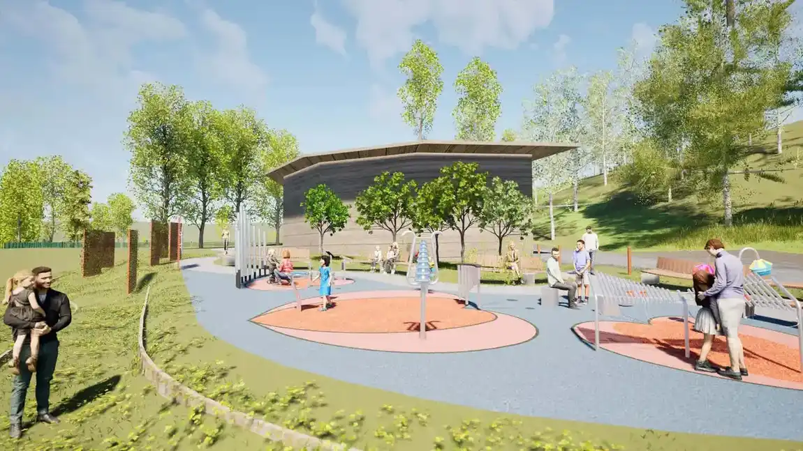 Rendered view of a music park with chime towers and families playing, afternoon light